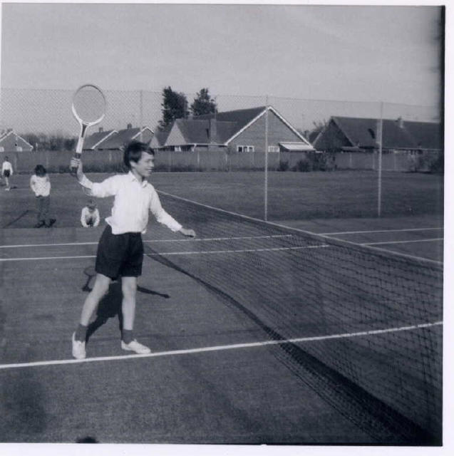 Randall playing Tennis